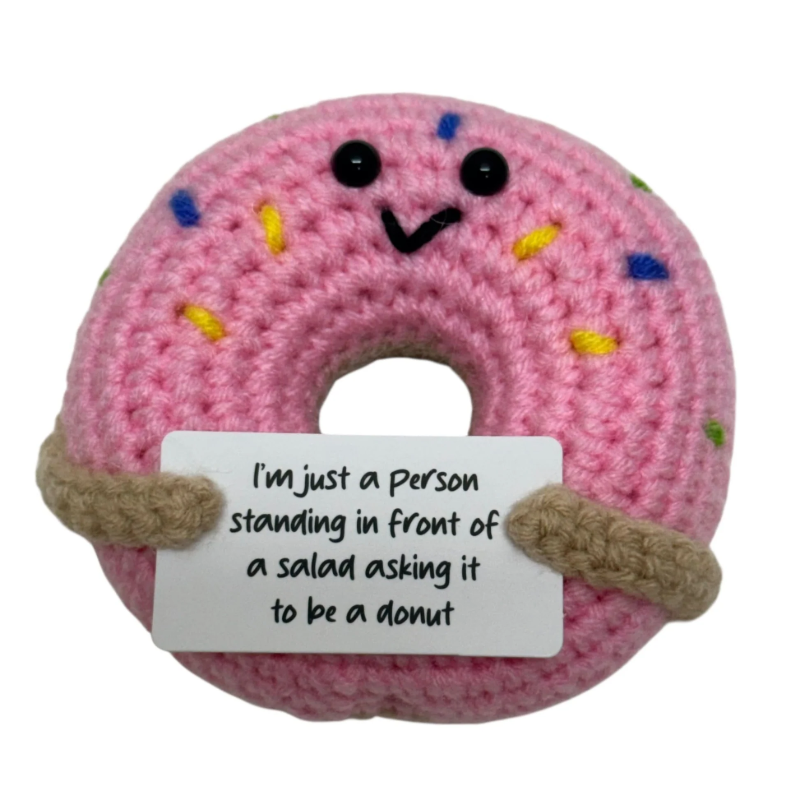 Kaiko  Plush Hand Crochet Supports Standing in front of a salad asking it to be a Donut